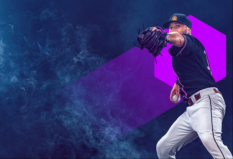 a baseball pitcher getting ready to pitch the ball